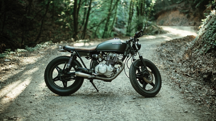 Honda motorcycle on a forest road 4K