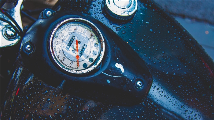 Motorcycle speedometer with water drops