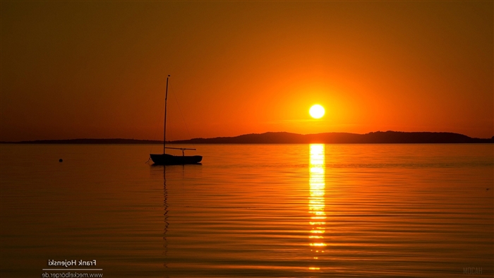Sailboat on the water during sunset 4K