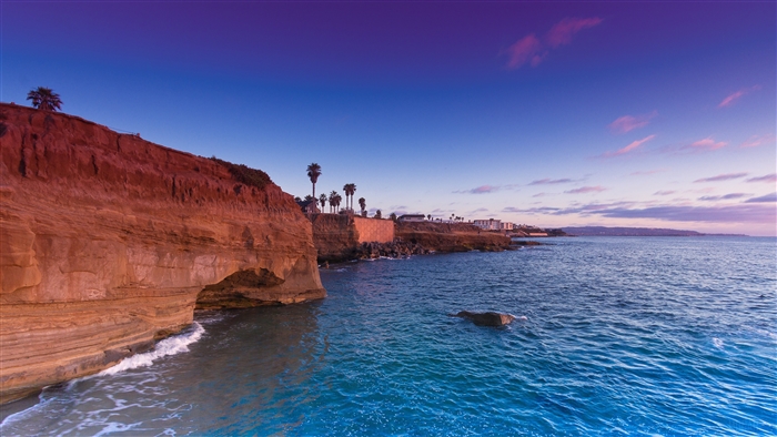 Coastal Cliffs and Ocean at Sunset 4K