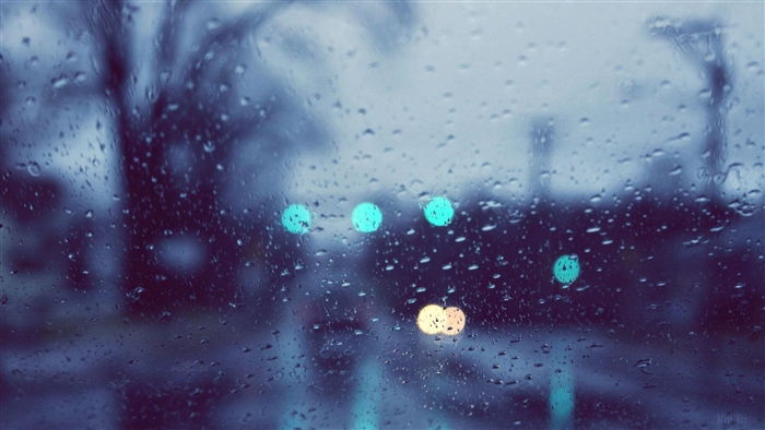 Rainy window with bokeh lights 4k