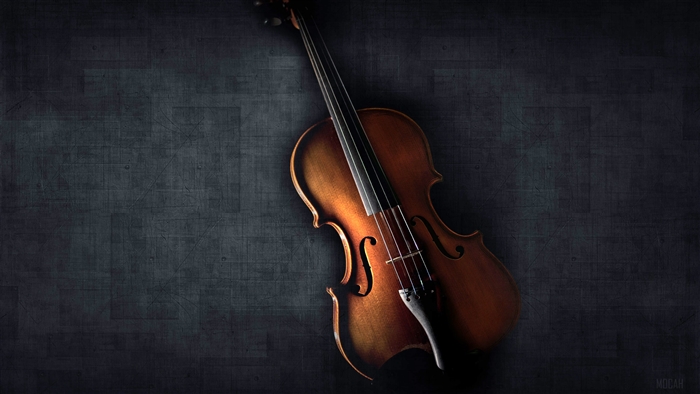 Violin on a dark textured background