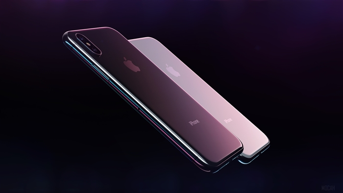 Two iPhones on a dark background
