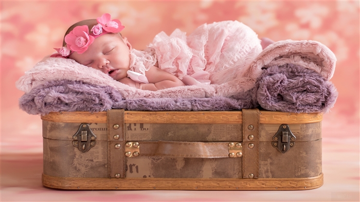 Cute Baby Sleeping on Suitcase 4K