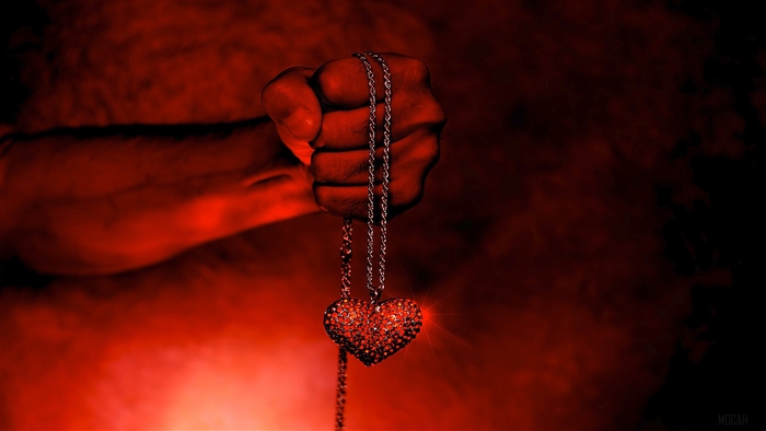 Hand Holding Heart Necklace 4K