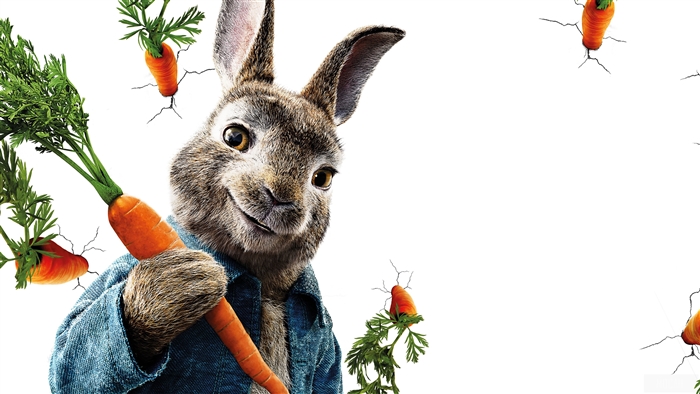 Peter Rabbit holding a carrot