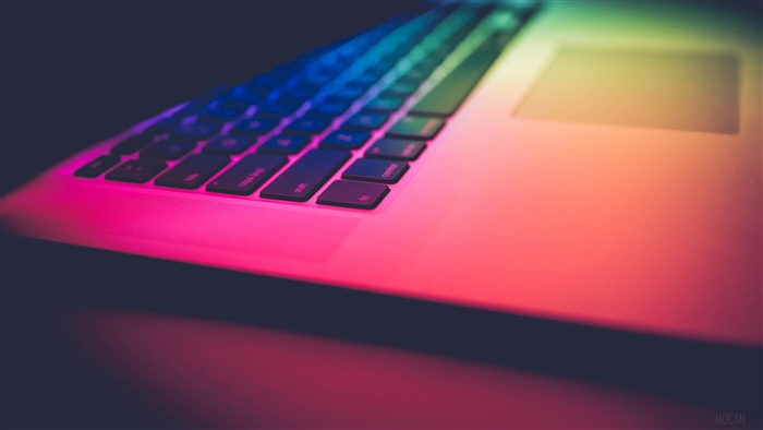 Apple MacBook keyboard with colorful lighting