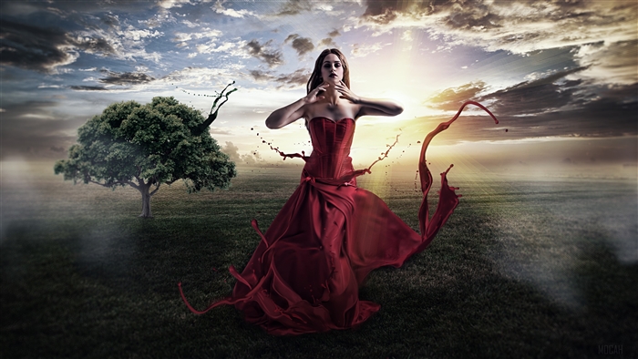 Girl in red dress with paint splashes and tree