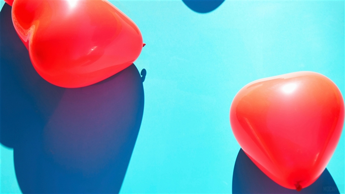 Red Heart Balloons on Bright Blue Surface 4K