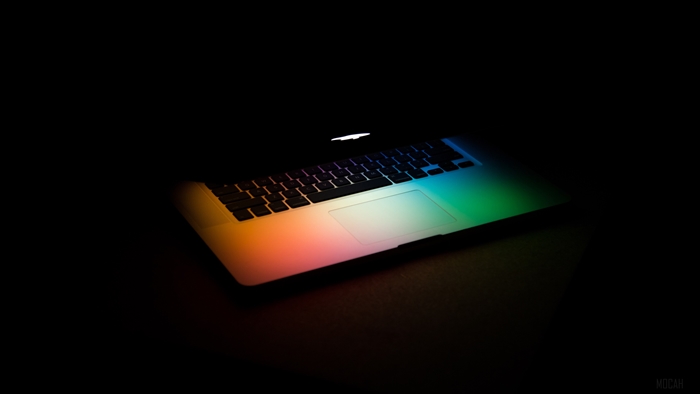 Apple MacBook with rainbow lighting 4K