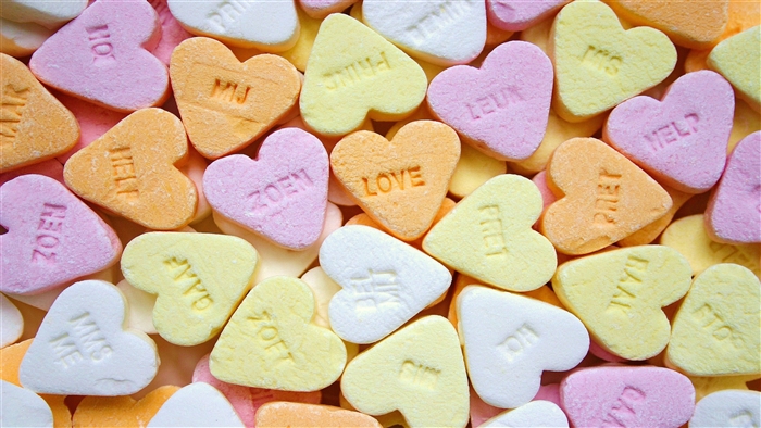 Heart-shaped candies with words