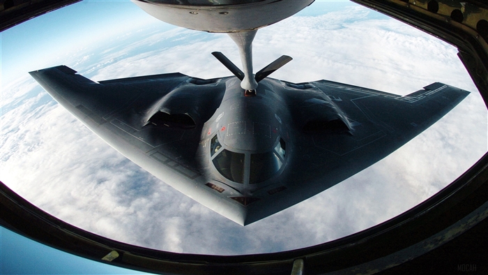 B-2 Spirit Bomber refueling in the sky 4K