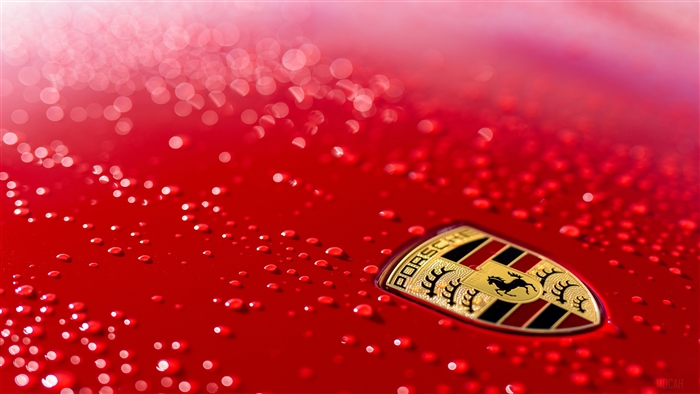 Porsche Logo on Red Car with Water Droplets 4K