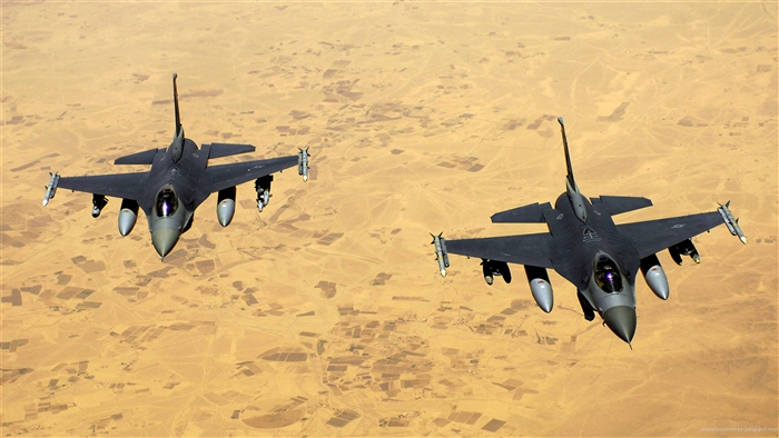 Two Air Force F-16 Fighter Jets Flying Over Desert
