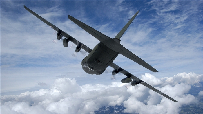 Bomber Aircraft flying through clouds