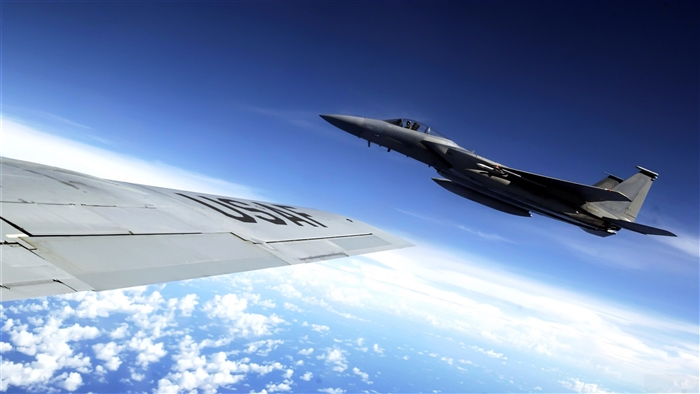 F-15 Eagle flies alongside KC-135 Stratotanker 4K