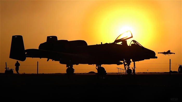 Silhouette of A-10 Warthog aircraft at sunset