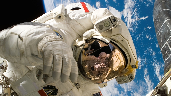 Astronaut in space with Earth in background 4K