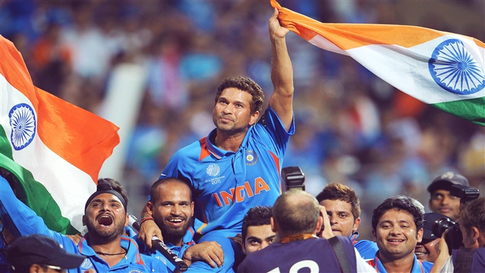 Sachin Tendulkar and Indian Cricket Team celebrating with flag 4K