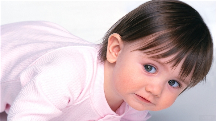 Cute baby in pink outfit