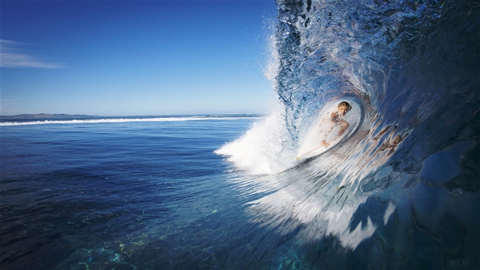 Female Surfer Riding a Wave in 4K