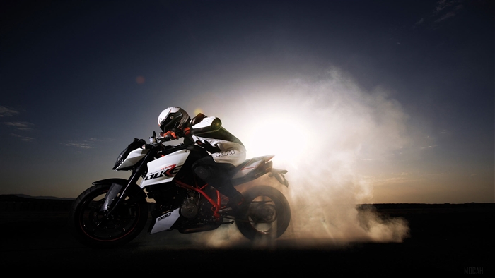KTM 990 Super Duke motorcycle performing a burnout