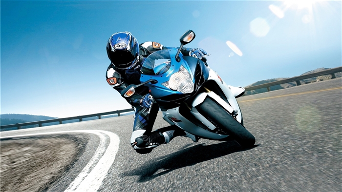 Suzuki Motorcycle Rider on a Curved Road 4K