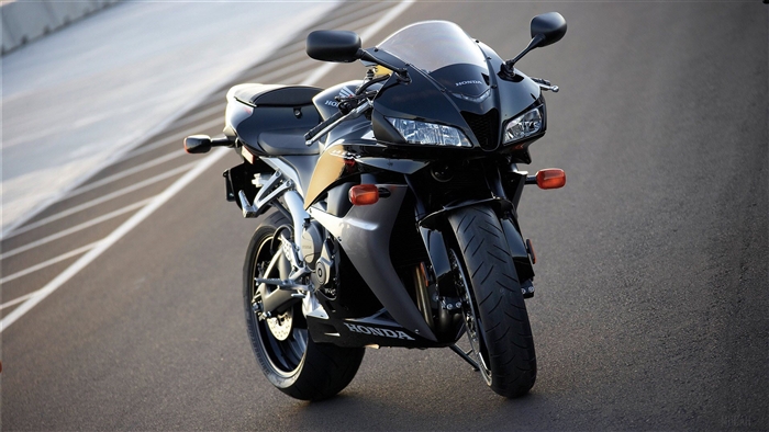 Black Honda CBR 600RR motorcycle on road 4K