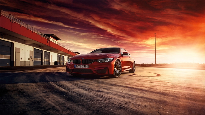 Red BMW M4 Coupe on Race Track at Sunset 4K