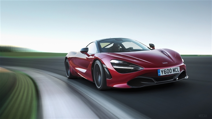Red McLaren 720S driving on a track 4K