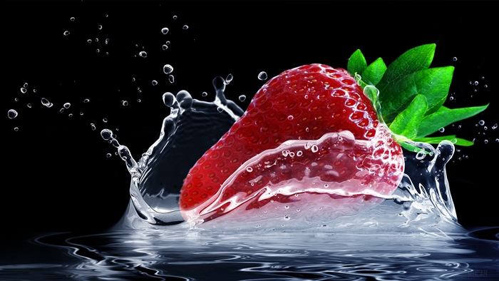 Strawberry splashing into water 4K