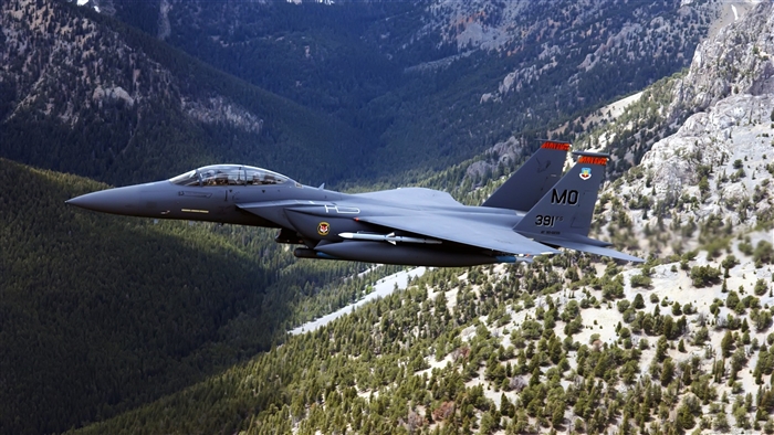 US Military F-15 Eagle Jet Over Mountains
