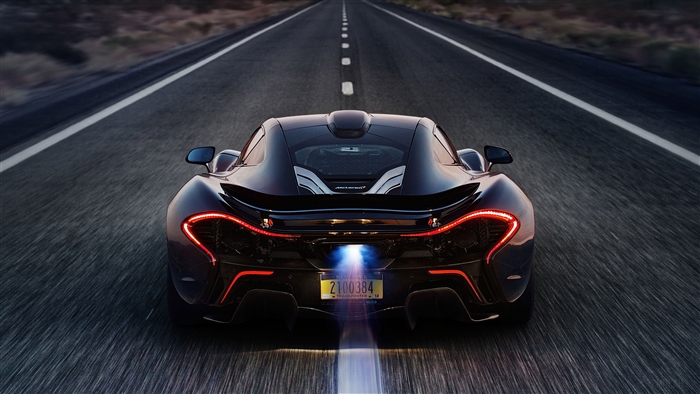 McLaren P1 driving on a desert highway