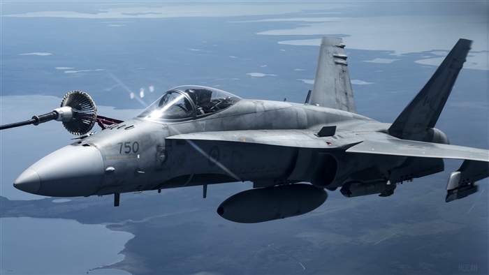 McDonnell Douglas FA-18 Hornet refueling in flight 4K