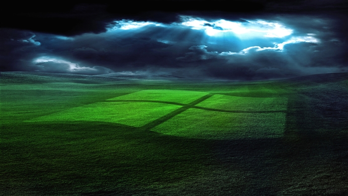 Windows logo on a grassy field under stormy sky 4K