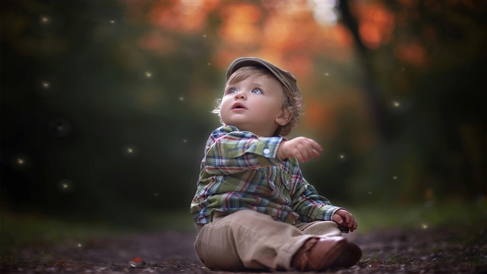 Cute Little Boy in a Cap Looking Up 4K