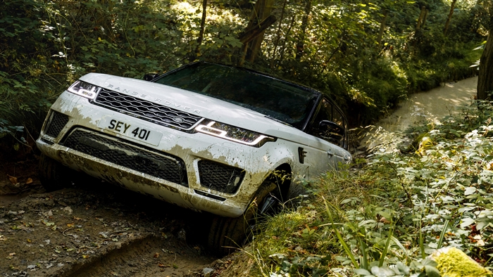White Range Rover Sport P400e Autobiography off-roading