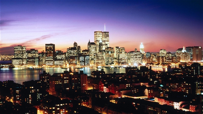 Lower Manhattan skyline over Brooklyn Heights at dusk, New York 4K