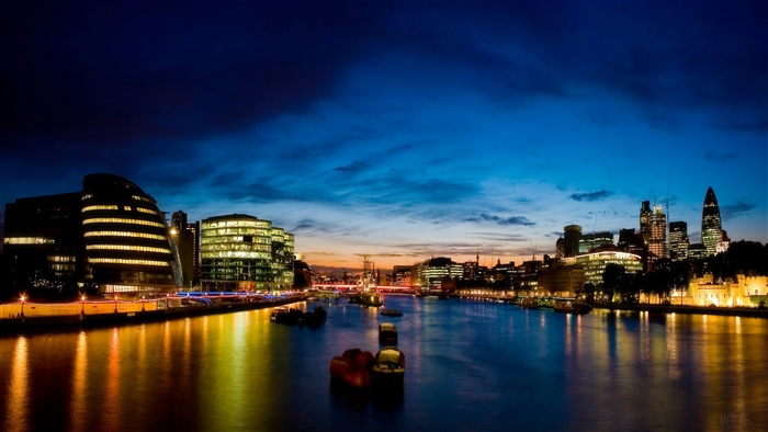 London skyline at dusk with River Thames