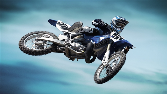 2008 Yamaha YZ250 motocross bike in mid-air