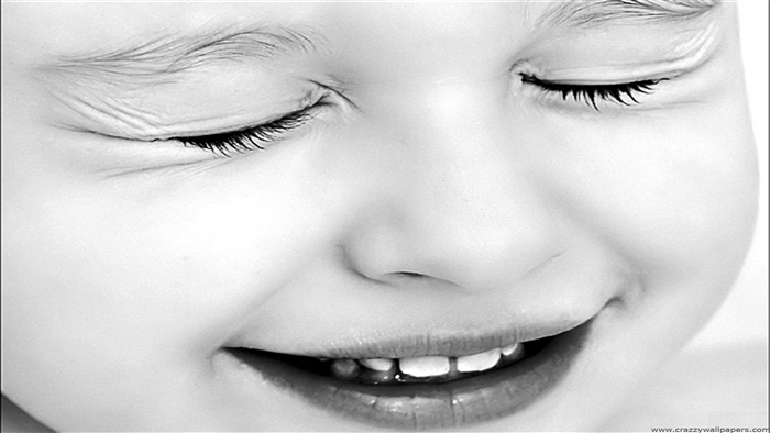 Cute baby smiling in black and white 4K