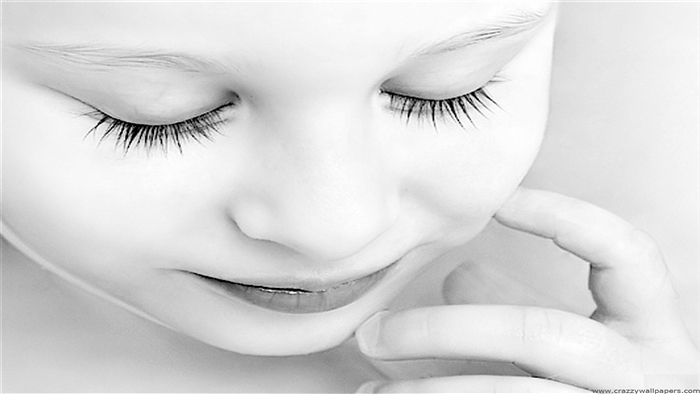 Close-up of a baby's face with closed eyes
