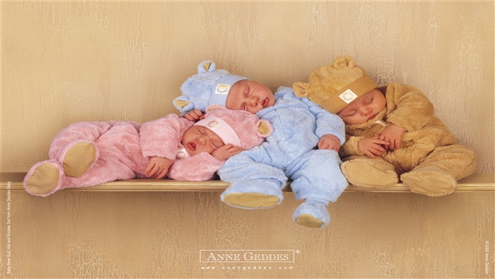 Three Sleeping Babies in Bear Costumes