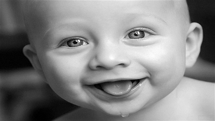 Close-up of a smiling baby in 4K
