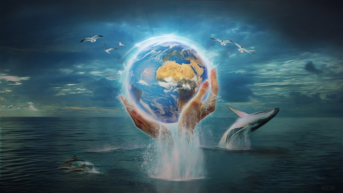 Hands holding Earth with marine life and birds