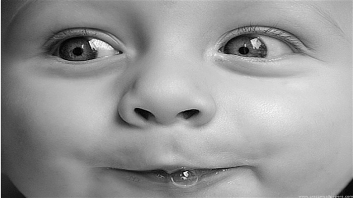Close-up of a baby's face with a bubble