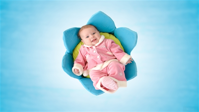 Cute Newborn Baby in Flower Prop 4K