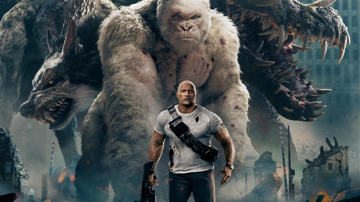 Dwayne Johnson with monsters from Rampage