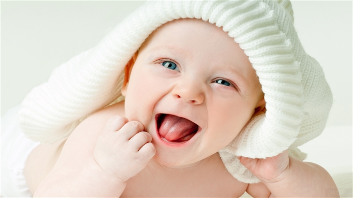 Cute Baby Boy Wearing White Knitted Hat