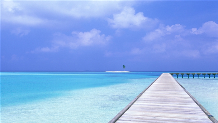 Wooden Pier on Turquoise Water with Distant Island 4K